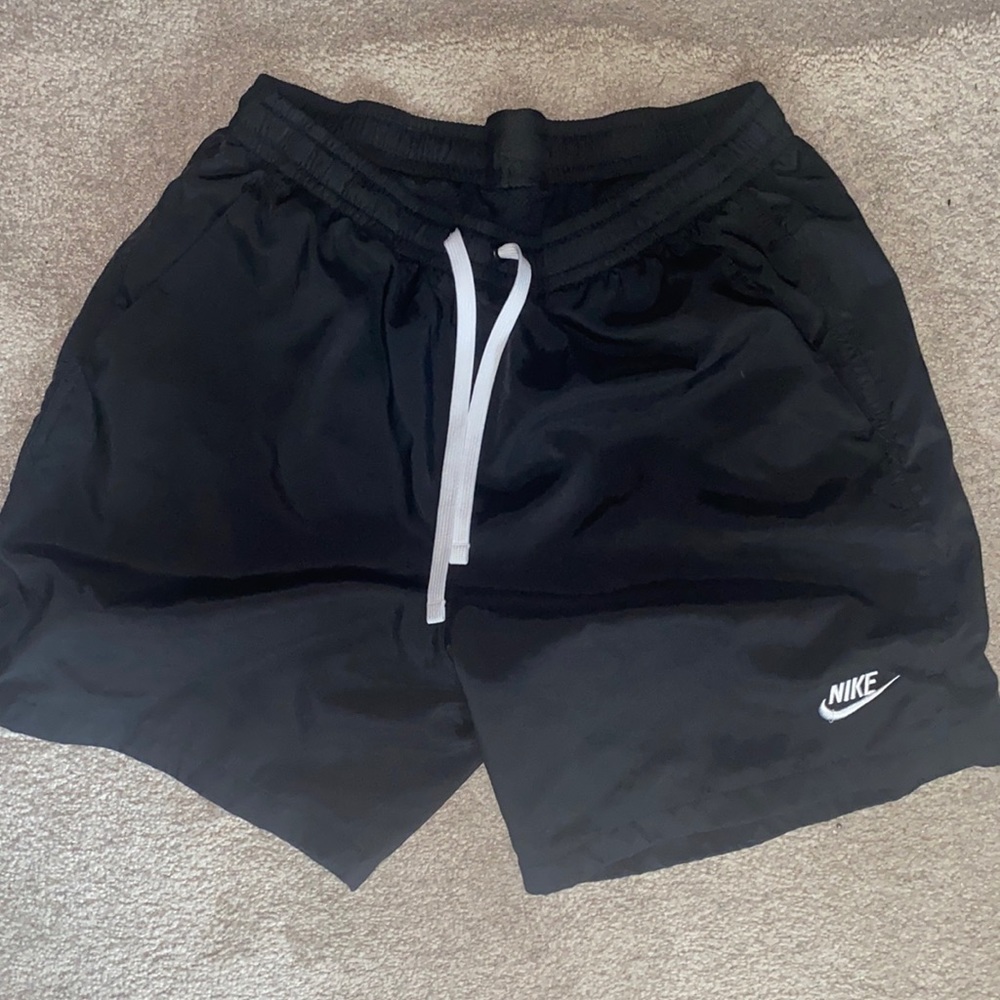 I outgrew these Nike shorts. Nike Woven shorts. Worn only ONCE.